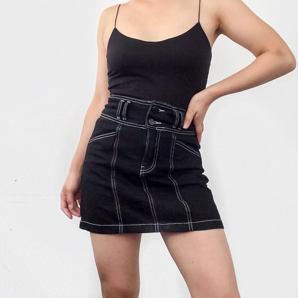 black denim skirt with white stitching